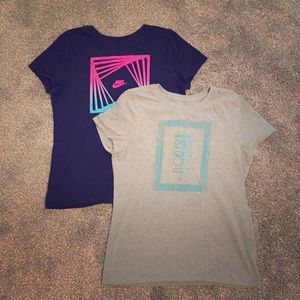 Two girls Nike shirts